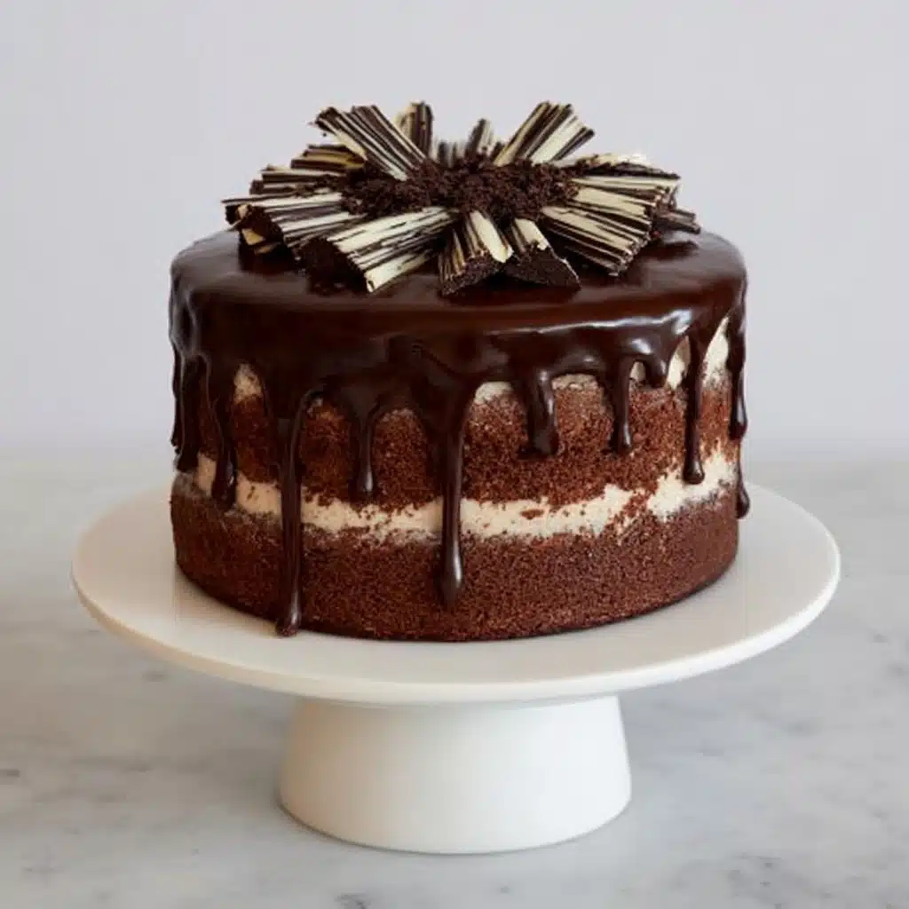 Decadent Chocolate Mud Cake with Choc-Swirled Cream Recipe - Recipe Image
