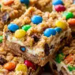 Monster Cookie Cheesecake Bars Recipe