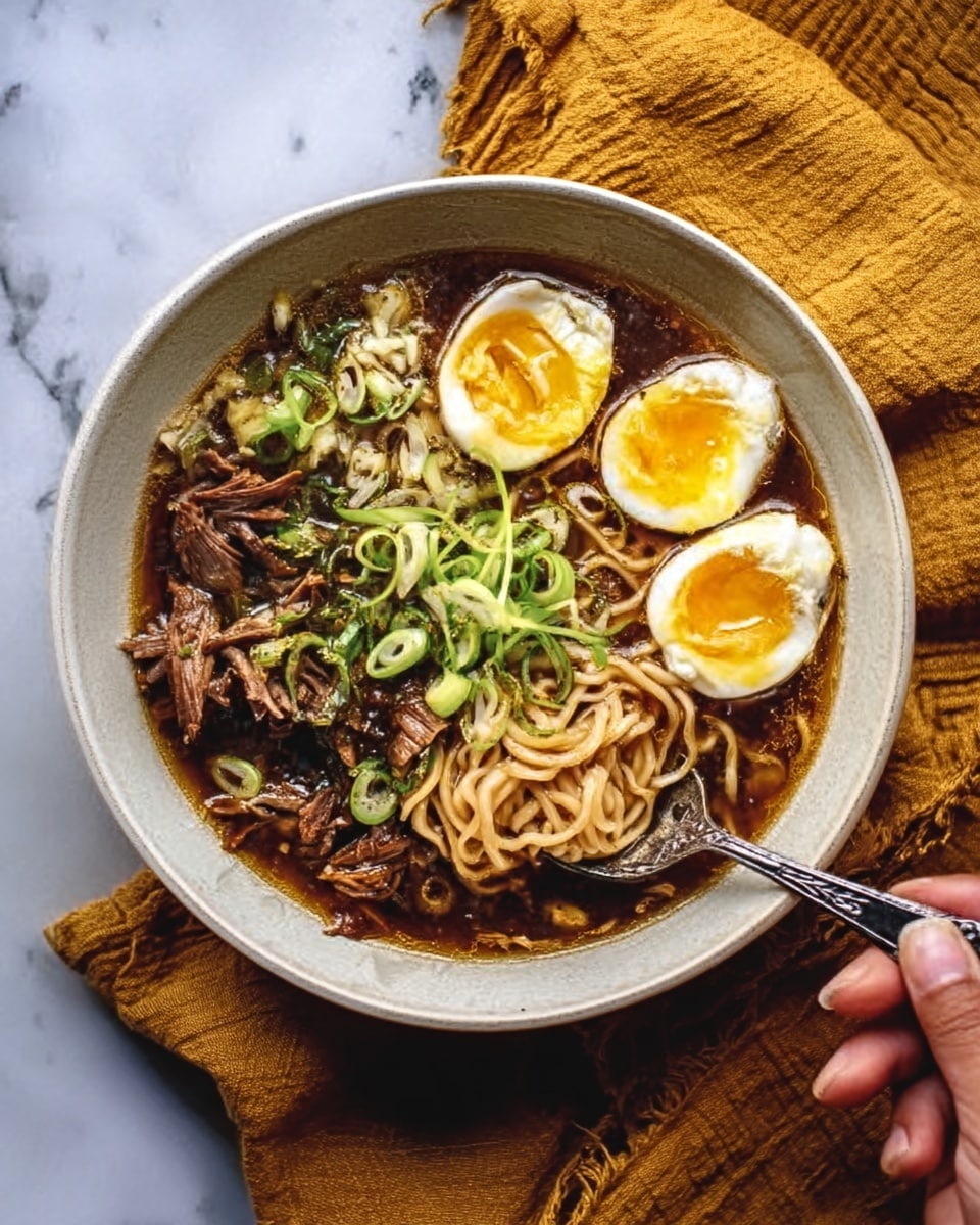 The image shows a bowl of ramen with three main layers: the bottom layer is dark brown broth filling the bowl, the middle layer contains long, thin noodles tangled and resting in the broth, and the top layer has several toppings including a halved soft-boiled egg with bright yellow yolks, green onions chopped into small pieces, thin green leaves or herbs, and slices of tender meat with a brown color. The bowl is white and round, sitting on a white marbled surface with a mustard yellow cloth nearby. Woman's hand is holding a spoon inside the bowl, ready to scoop the noodles. Photo taken with an iphone --ar 4:5 --v 7